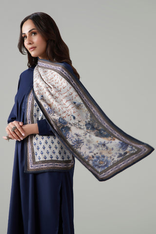 Blue Stole, made from Crinkle Silk, is a printed stole, featuring the words of Mir Taqi Mir calligraphed throughout.