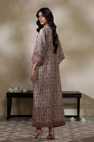 Manto's Alira long length Kaftaan in shades of sand, paired with straight pants. 