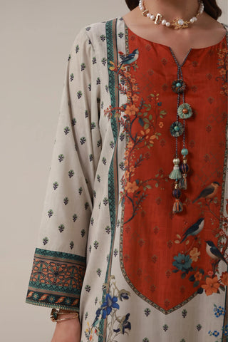 Printed kaftan with embellishments on the neckline, and the words of Jaleel Manikpuri calligraphed across.