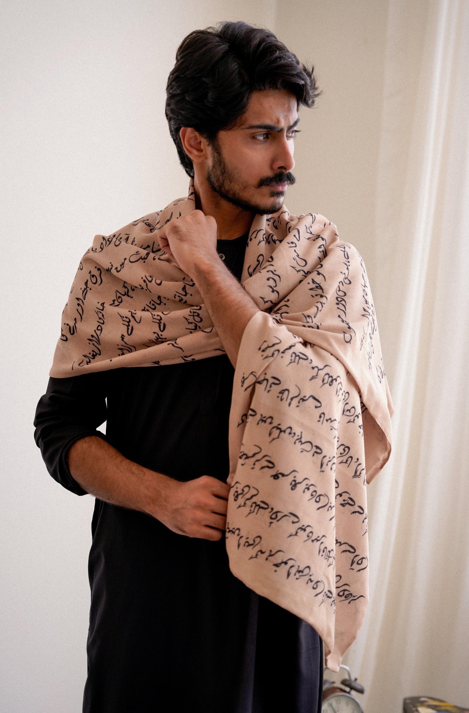 Shopmanto, wear manto pakistani clothing brand ready to wear men and women textured double sided beige armaan stole muffler with urdu calligraphy featuring poetry of mirza ghalib, urdu winter stoles