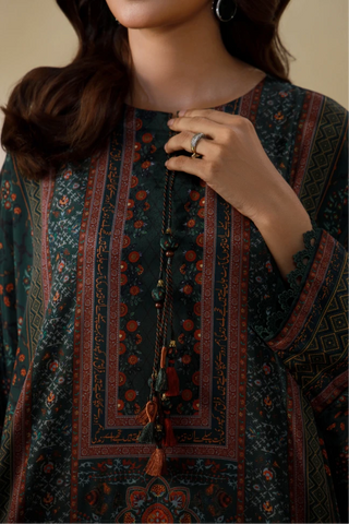 Manto's Alira long length Kaftaan in shades of forest, paired with straight pants. 