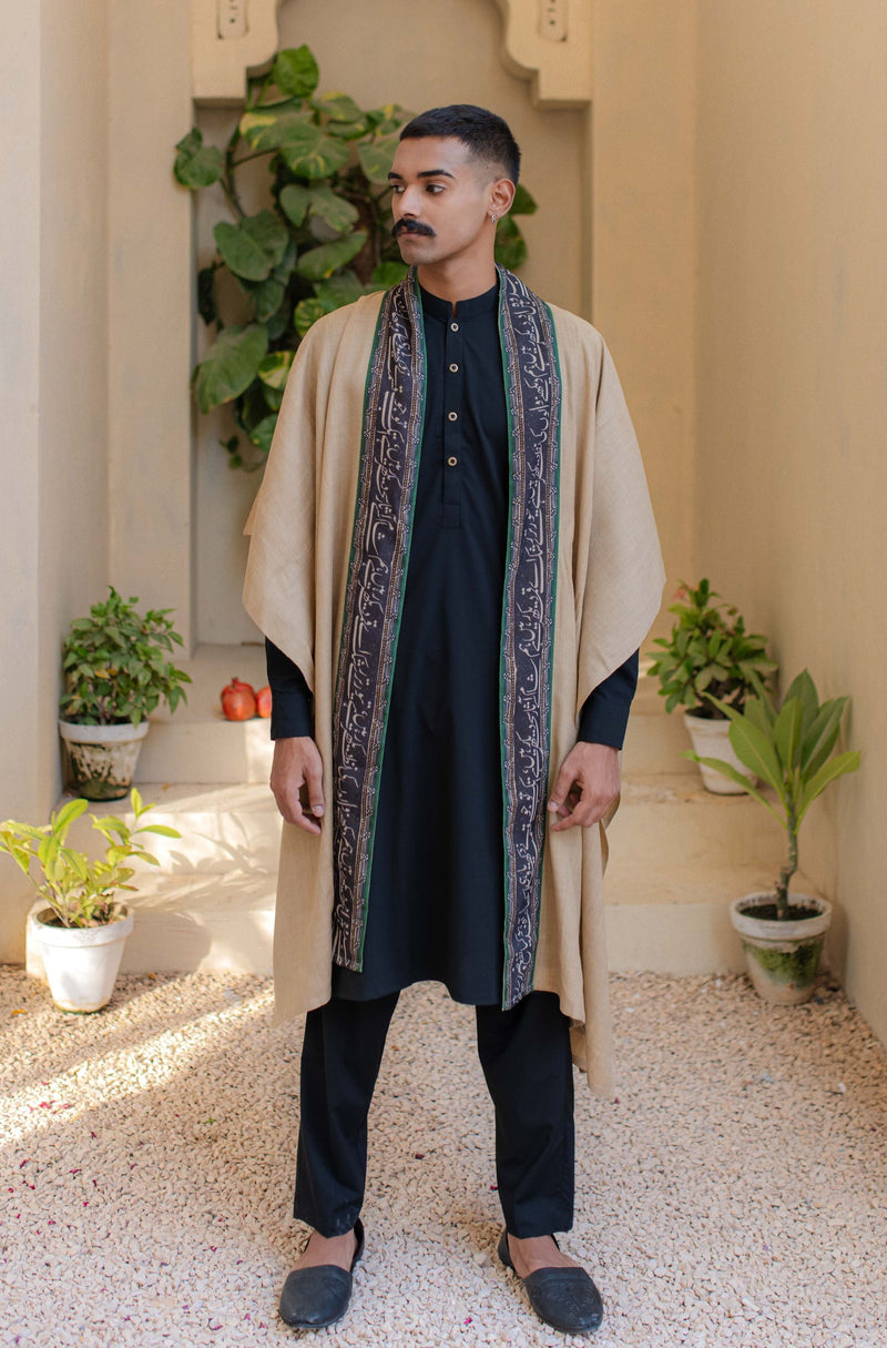 Shopmanto, wear manto, manto clothing brand, unisex cape shawl, cape shawl, men cape shawl, women cape shawl, capes, shawl, winter wear, eastern, western, urdu calligraphy on the cape shawl, cape in beige, sehar cape, men outerwear, women outerwear, sehar cape beige and green, manto capes, manto shawl