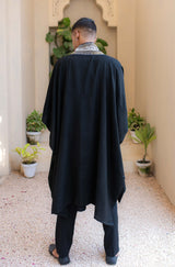 Shopmanto, wear manto, manto clothing brand, unisex cape shawl, cape shawl, men cape shawl, women cape shawl, capes, shawl, winter wear, eastern, western, urdu calligraphy on the cape shawl, cape in black, zamana cape, men outerwear, women outerwear, zamana cape black and olive green, manto capes, manto shawl