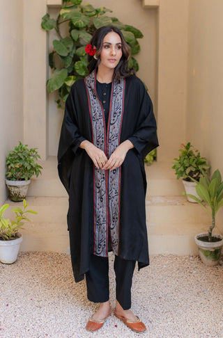 Shopmanto, wear manto, manto clothing brand, unisex cape shawl, cape shawl, men cape shawl, women cape shawl, capes, shawl, winter wear, eastern, western, urdu calligraphy on the cape shawl, cape in black, shahkaar cape, men outerwear, women outerwear, shahkaar cape black and grey, manto capes, manto shawl
