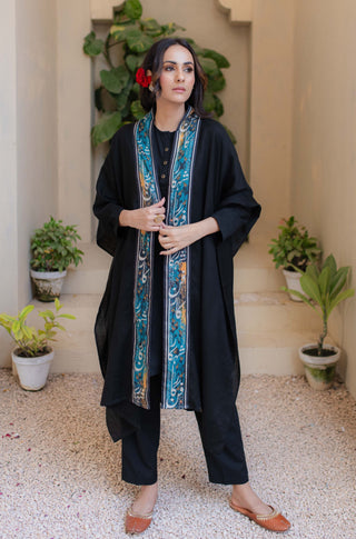 Shopmanto, wear manto, manto clothing brand, unisex cape shawl, cape shawl, men cape shawl, women cape shawl, capes, shawl, winter wear, eastern, western, urdu calligraphy on the cape shawl, cape in black, shahkaar cape, men outerwear, women outerwear, shahkaar cape black and teal, manto capes, manto shawl