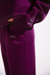 Shopmanto, wear manto, pakistan, women, men, ladies, clothing, urdu, calligraphy, jogger pants, winter wear, karachi, western clothing, manto store, urdu calligraphy clothing, unisex jogger pants, unisex winter wear, hoodies in pakistan, jogger pants for men, jogger pants for women, track pants, track suits, comfort, soft, very plum Jogger pants, manto logo embroidery on jogger pants, comfort revolution