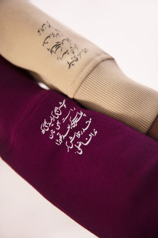 Talaash sweatshirt, urdu text print on the sleeves of swearshirt