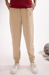 Shopmanto, wear manto, pakistan, women, men, ladies, clothing, urdu, calligraphy, jogger pants, winter wear, karachi, western clothing, manto store, urdu calligraphy clothing, unisex jogger pants, unisex winter wear, hoodies in pakistan, jogger pants for men, jogger pants for women, track pants, track suits, comfort, soft, French vanilla Jogger pants, manto logo embroidery on jogger pants, comfort revolution