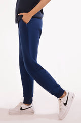 Shopmanto, wear manto, pakistan, women, men, ladies, clothing, urdu, calligraphy, jogger pants, winter wear, karachi, western clothing, manto store, urdu calligraphy clothing, unisex jogger pants, unisex winter wear, hoodies in pakistan, jogger pants for men, jogger pants for women, track pants, track suits, comfort, soft, midnight blue Jogger pants, manto logo embroidery on jogger pants, comfort revolution