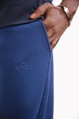 Shopmanto, wear manto, pakistan, women, men, ladies, clothing, urdu, calligraphy, jogger pants, winter wear, karachi, western clothing, manto store, urdu calligraphy clothing, unisex jogger pants, unisex winter wear, hoodies in pakistan, jogger pants for men, jogger pants for women, track pants, track suits, comfort, soft, midnight blue Jogger pants, manto logo embroidery on jogger pants, comfort revolution