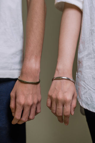Manto Unisex Gold & Silver Stainless Steel Talaash Cuff Bracelet (Kara) with Urdu Calligraphy of Poetry by Nida Fazli