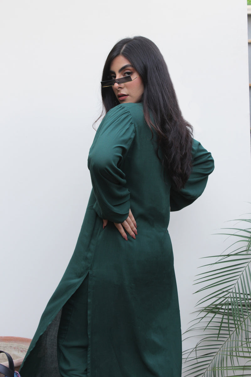 Dark green Lilen, 2 piece set from our Manto Aura Collection. It is a long, front-open kameez/ kurta with long balloon sleeves and trousers/ pajama pant